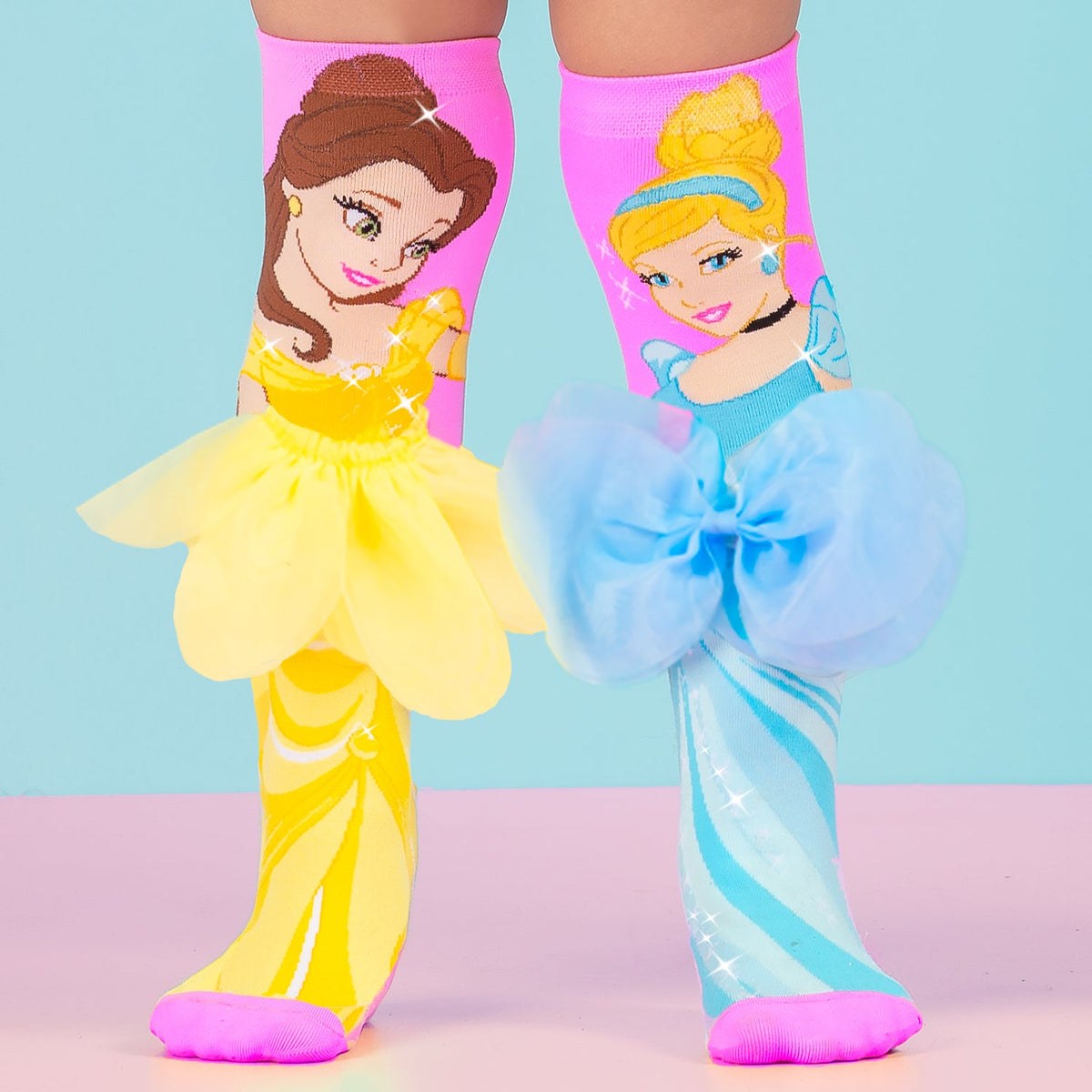 Disney Princess knee high socks featuring Belle and Cinderella with colorful character design.