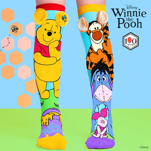 Colorful Disney Winnie the Pooh knee high socks featuring Pooh, Tigger, Eeyore and Piglet with plush 3D ears