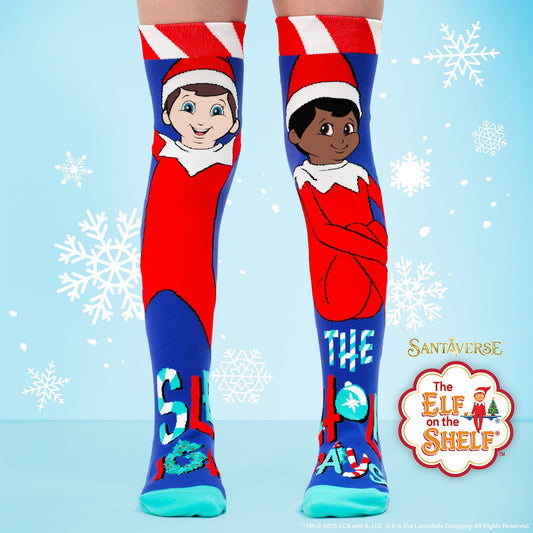 Elf on the Shelf knee high socks featuring festive character design with bright Christmas colors for kids and adults.