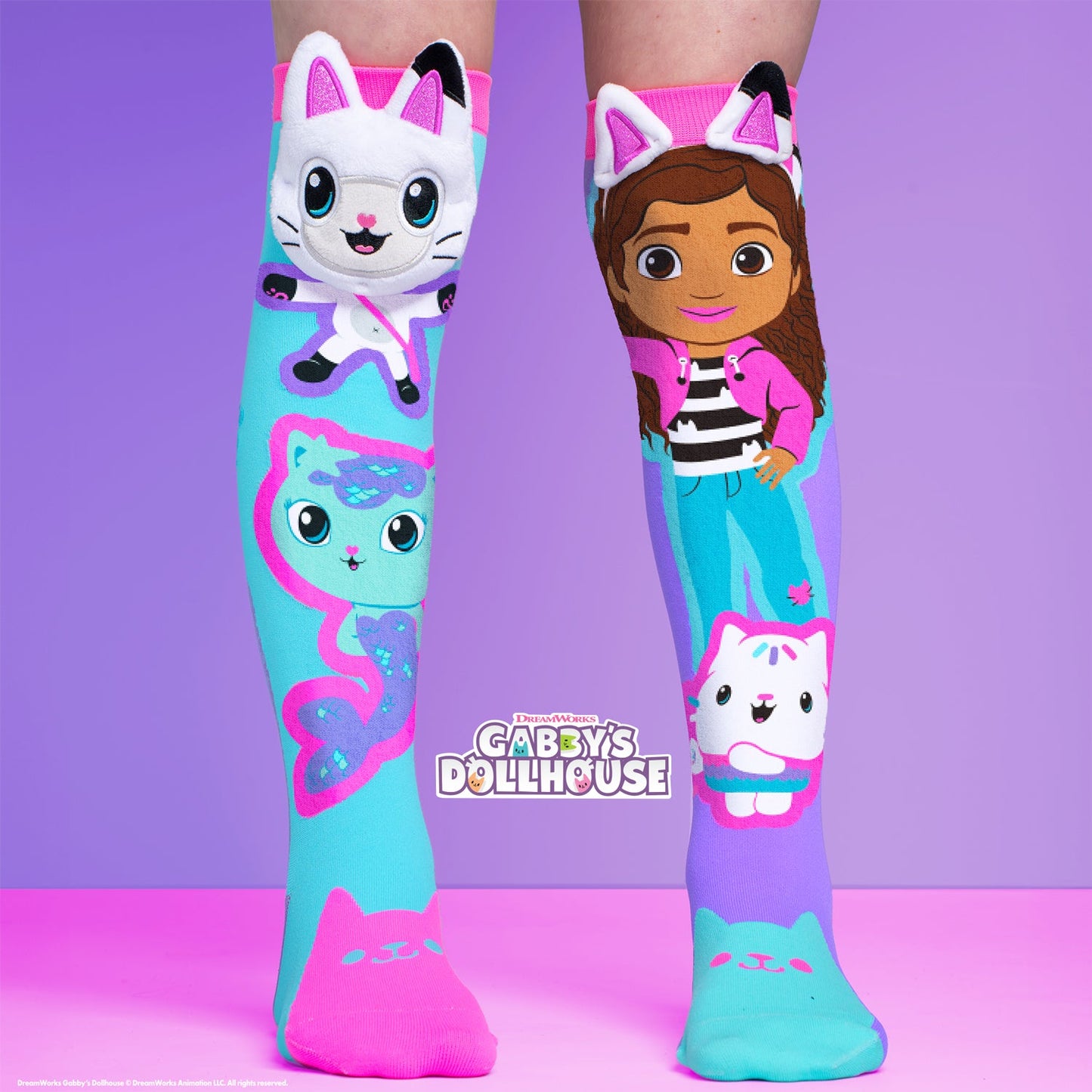 Gabby’s Dollhouse kids knee-high socks with Gabby and cartoon cat characters in bright colors